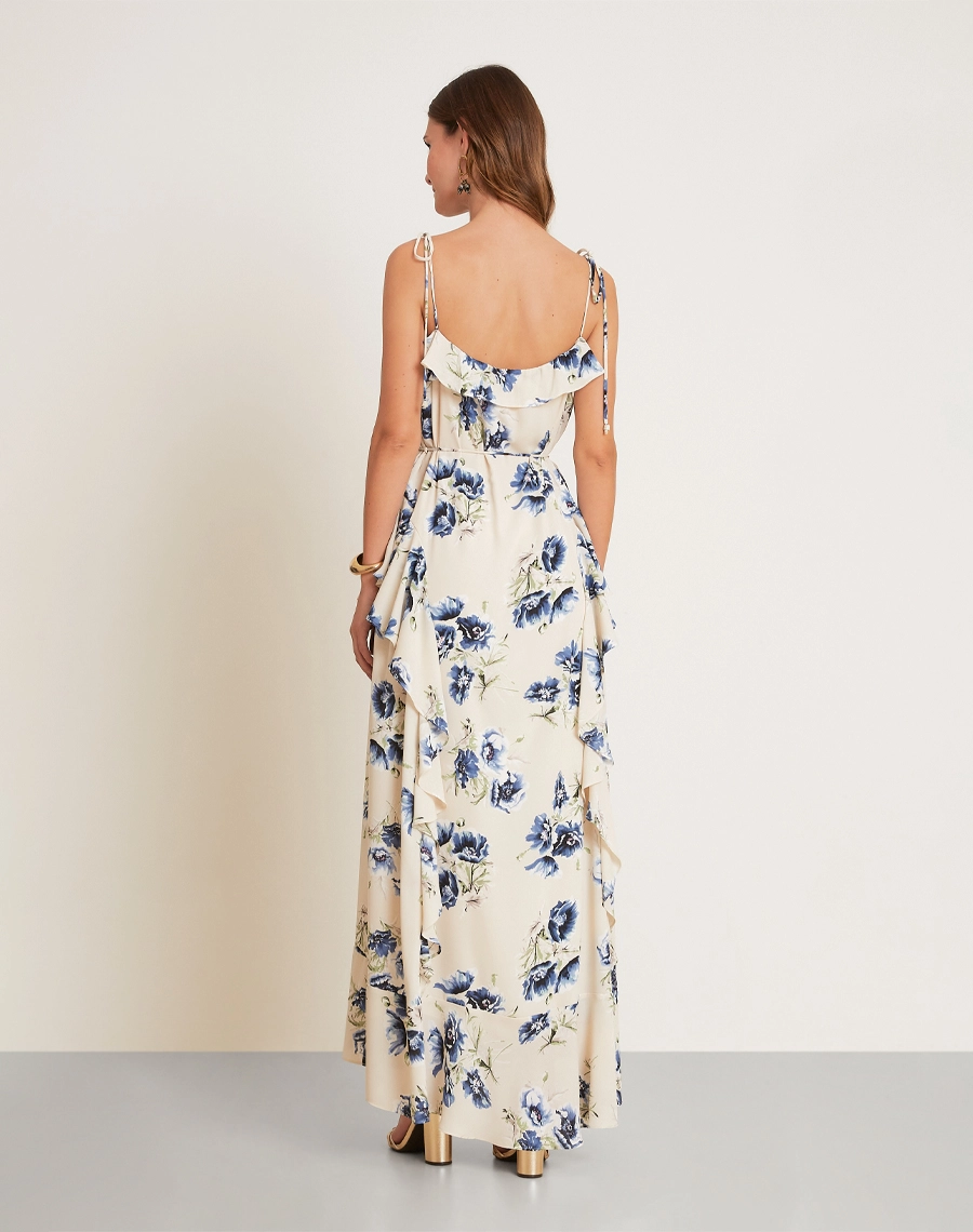 O Vestido Longo Dalia Blue é confeccionado em crepinho, tecido de textura delicada e caimento fluido, proporcionando leveza, movimento e um visual sofisticado. <br/>