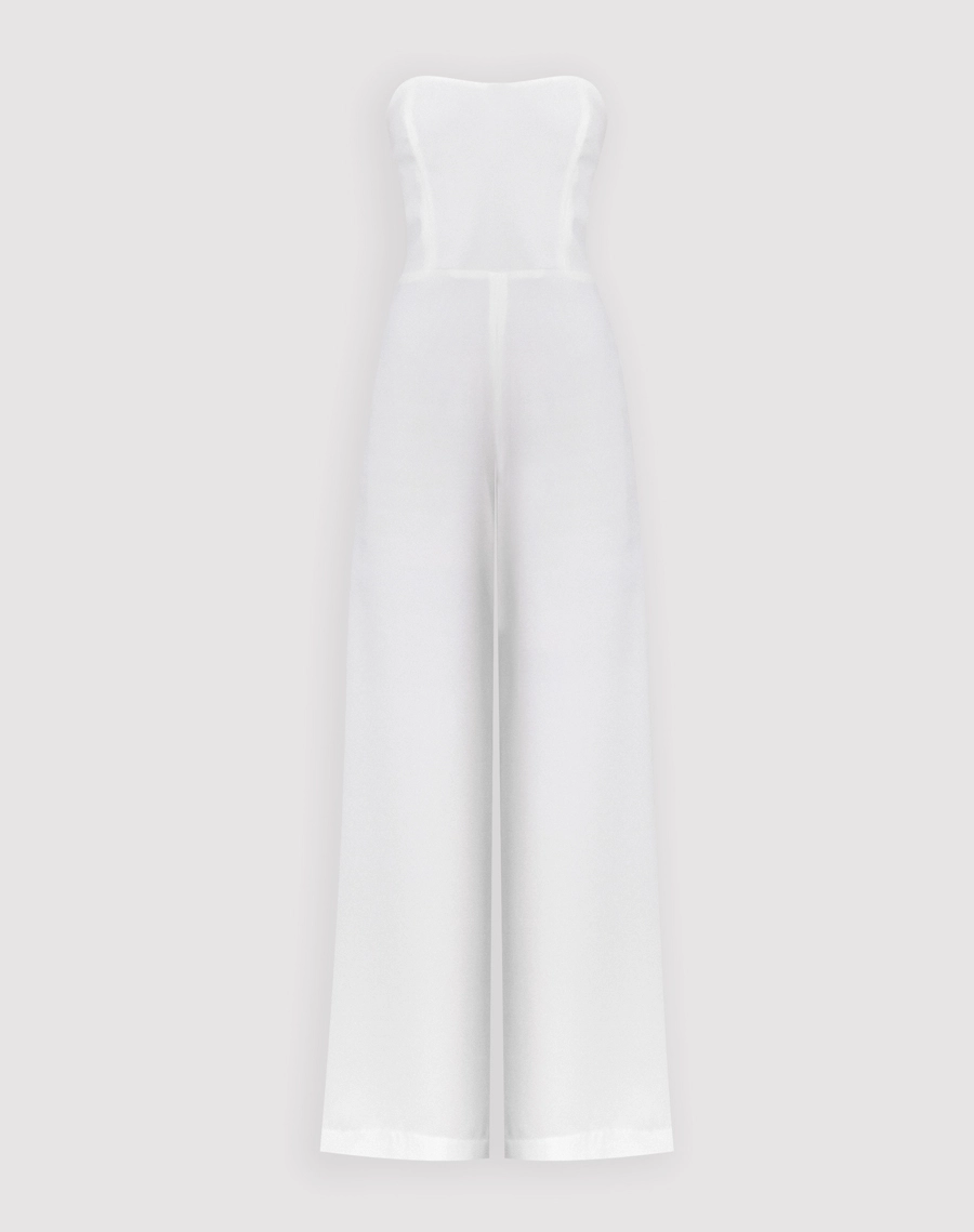 O Macacão Heloise é confeccionado em crepe zara, um tecido levemente texturizado que oferece um caimento leve e fluido, ideal para quem busca conforto e elegância.