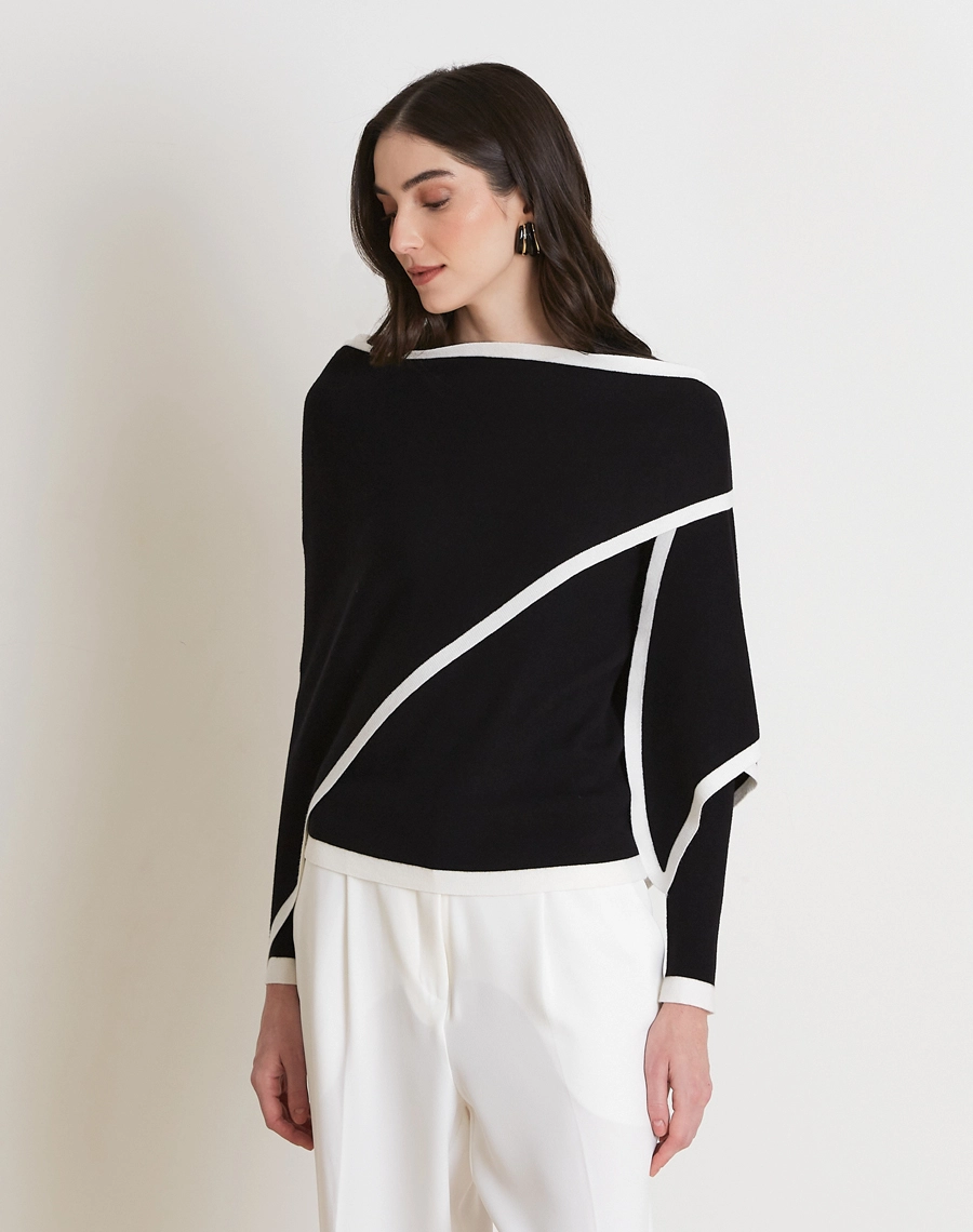 A Blusa Com Xale Coco é confeccionada em tricô, tecido leve, com toque macio e caimento fluido que proporciona conforto e elegância. 